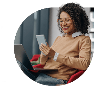 Smiling woman looking at tablet